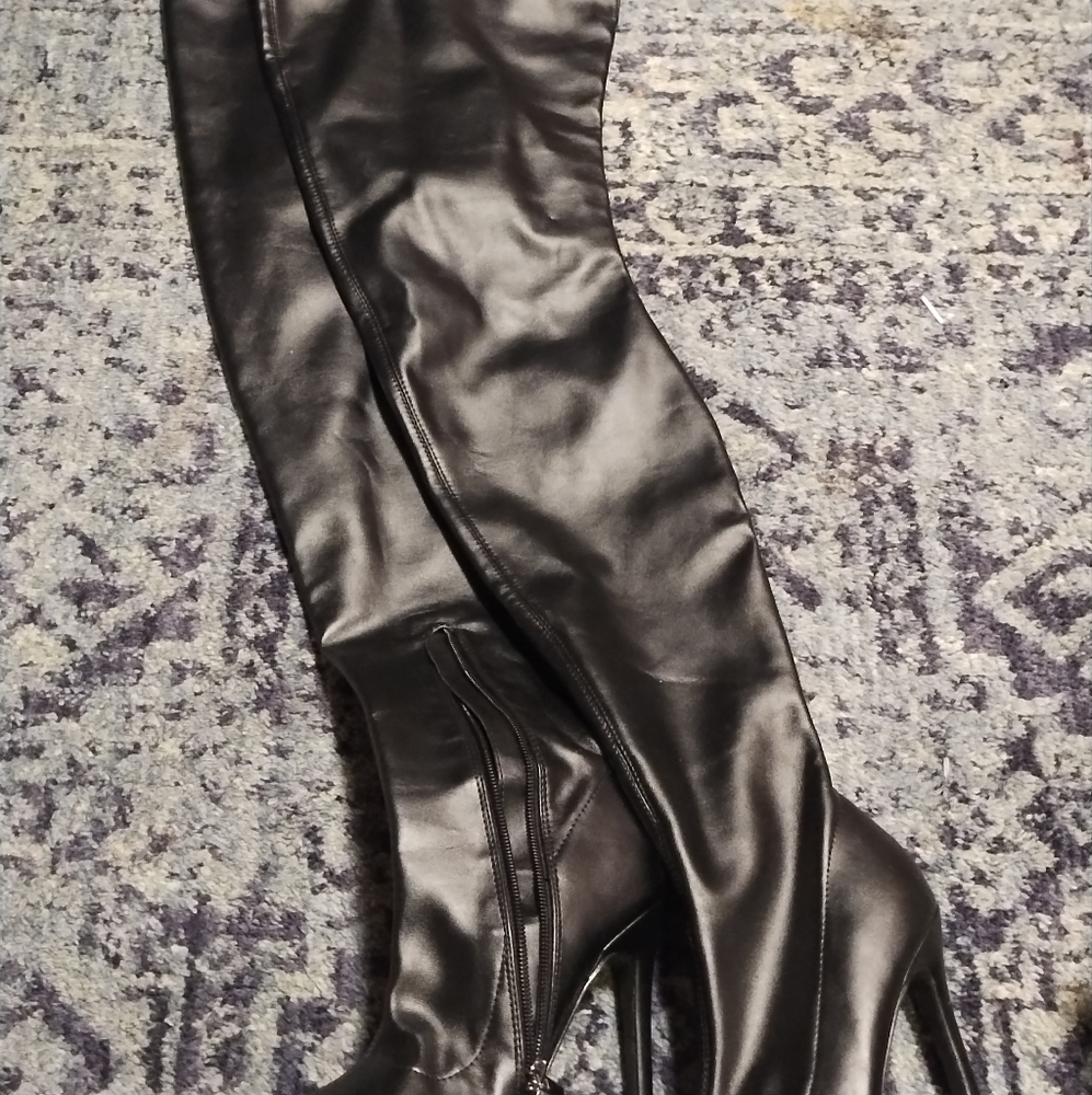 Thigh high black boots
